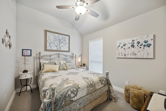 carpeted bedroom with ceiling fan and vaulted ceiling