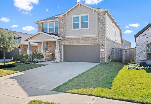 view of front facade featuring a garage and a front lawn