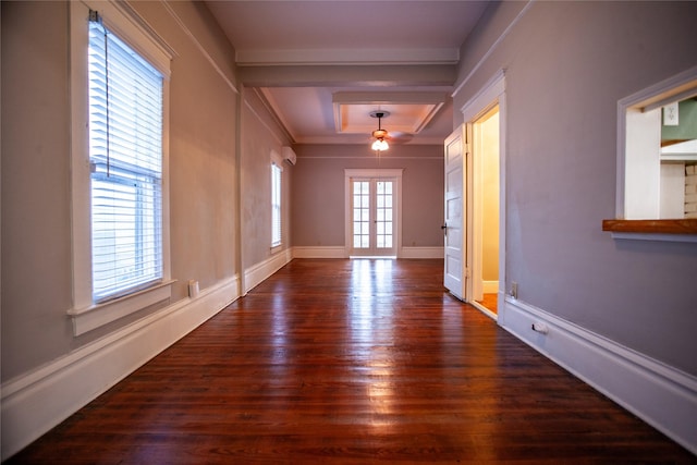 spare room with dark wood-type flooring and french doors