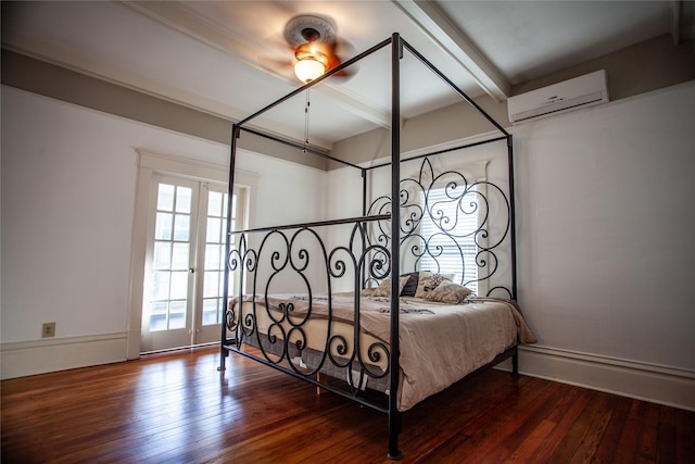 bedroom featuring ceiling fan, beam ceiling, dark hardwood / wood-style flooring, and a wall unit AC