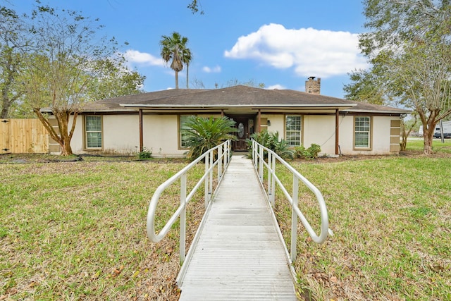 view of front of house with a front yard