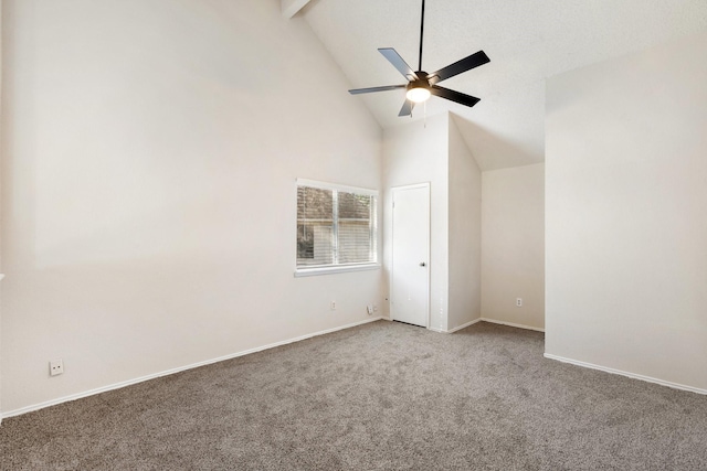 spare room featuring beamed ceiling, carpet, high vaulted ceiling, and ceiling fan