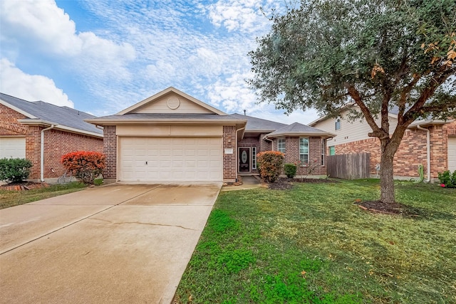 single story home with a front lawn and a garage