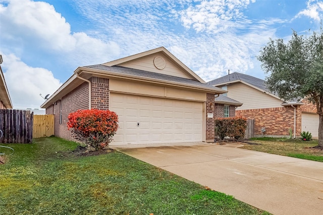 ranch-style house featuring a garage and a front yard