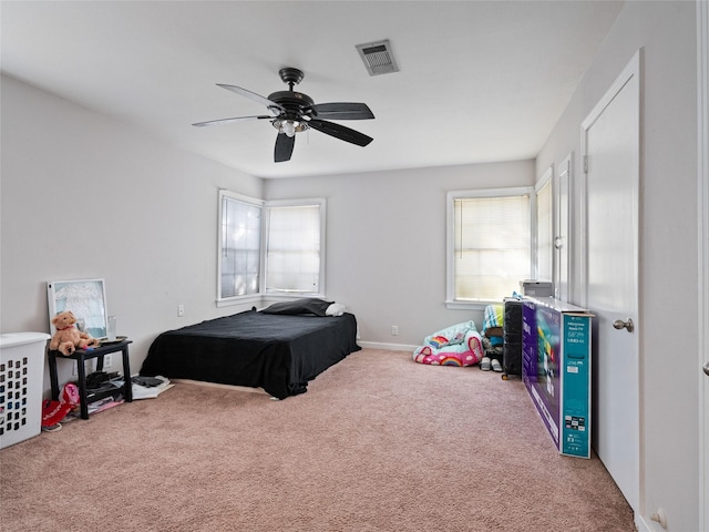 carpeted bedroom featuring ceiling fan