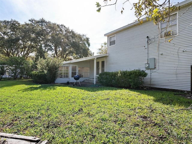 exterior space with a lawn