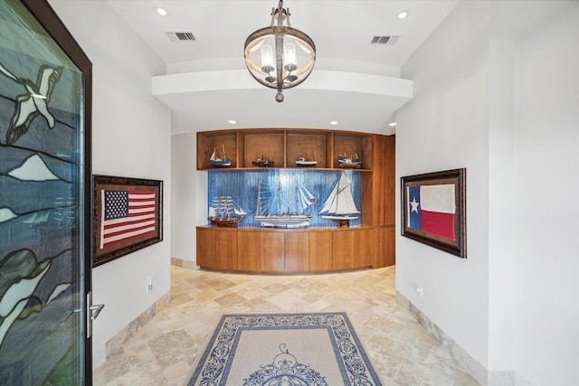 interior space with an inviting chandelier