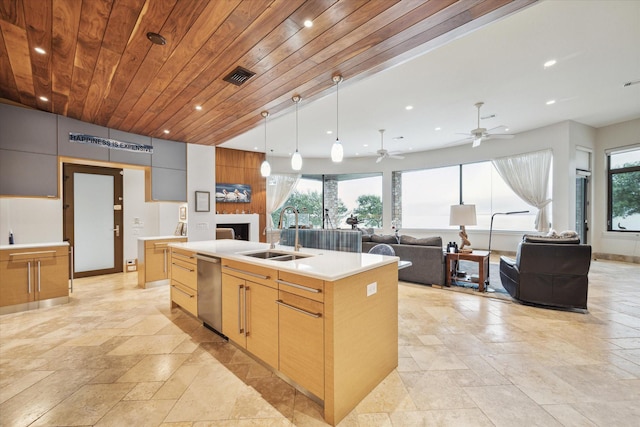 kitchen featuring sink, wooden ceiling, stainless steel dishwasher, pendant lighting, and a kitchen island with sink