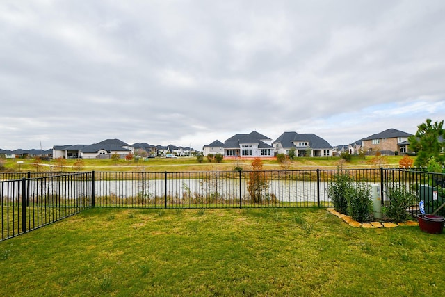 view of yard with a water view