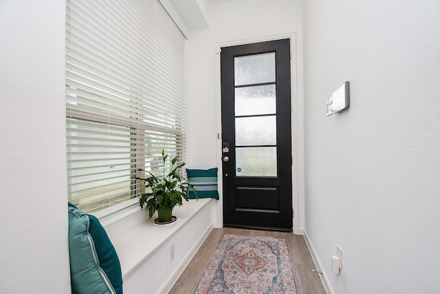 doorway featuring light hardwood / wood-style floors