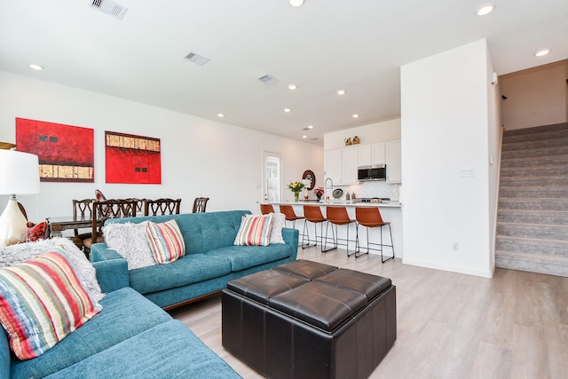 living room with light wood-type flooring