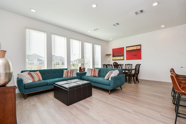 living room featuring light wood-type flooring