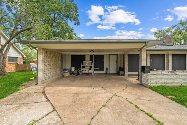 ranch-style home with a carport