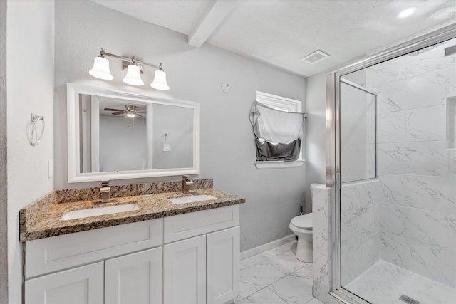 bathroom featuring vanity, toilet, walk in shower, and ceiling fan