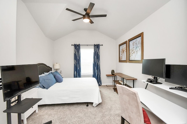 carpeted bedroom featuring vaulted ceiling and ceiling fan