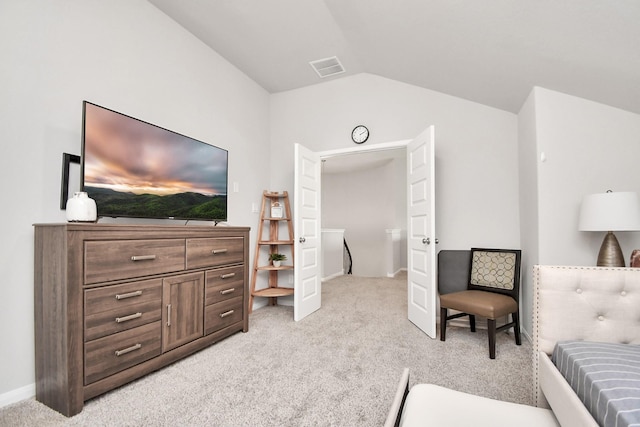 living area featuring light colored carpet and vaulted ceiling