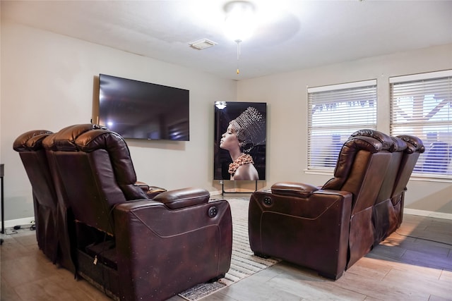 home theater featuring light hardwood / wood-style flooring