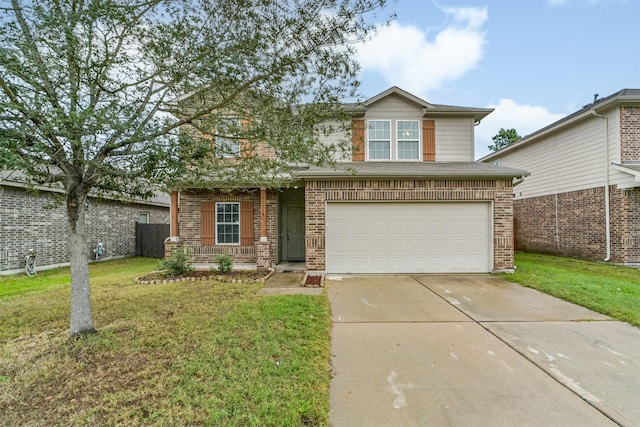 view of front facade with a front lawn and a garage