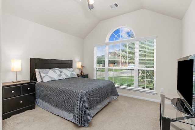 carpeted bedroom featuring lofted ceiling and ceiling fan