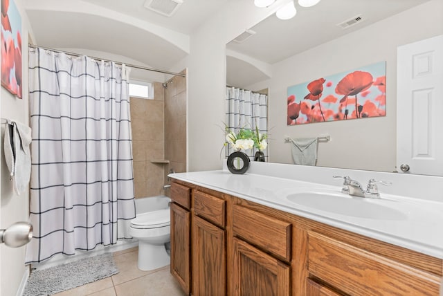 full bathroom with toilet, tile patterned flooring, shower / bath combo with shower curtain, and vanity