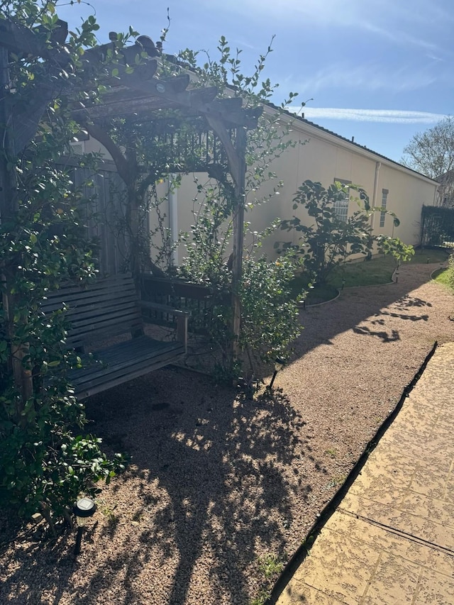 view of property exterior featuring fence