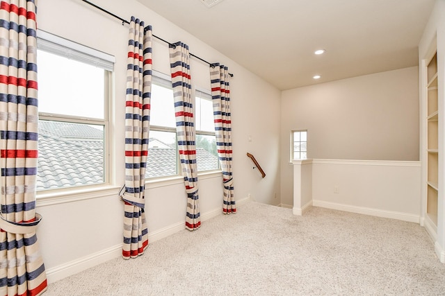 interior space featuring baseboards and recessed lighting