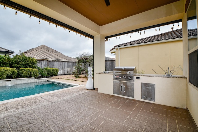 view of pool with a fenced in pool, a patio, grilling area, area for grilling, and a fenced backyard