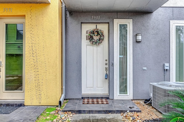 property entrance with central air condition unit