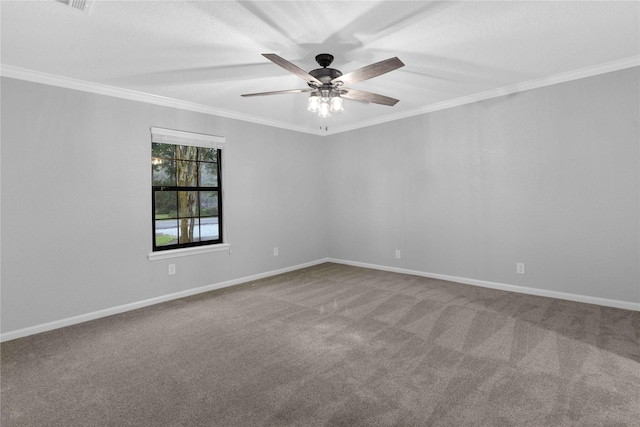 spare room with carpet, ceiling fan, and ornamental molding