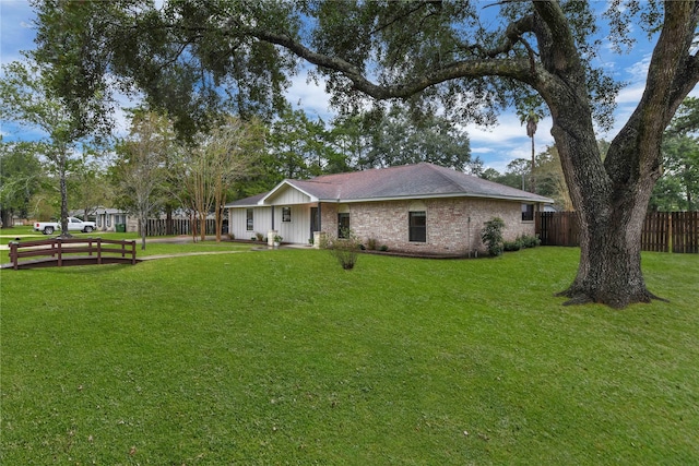 exterior space with a front yard