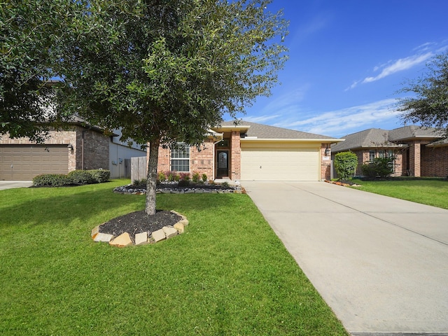 ranch-style house featuring a front yard and a garage