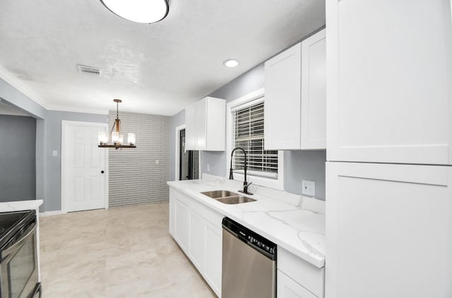 kitchen with stainless steel appliances, sink, decorative light fixtures, a chandelier, and white cabinetry