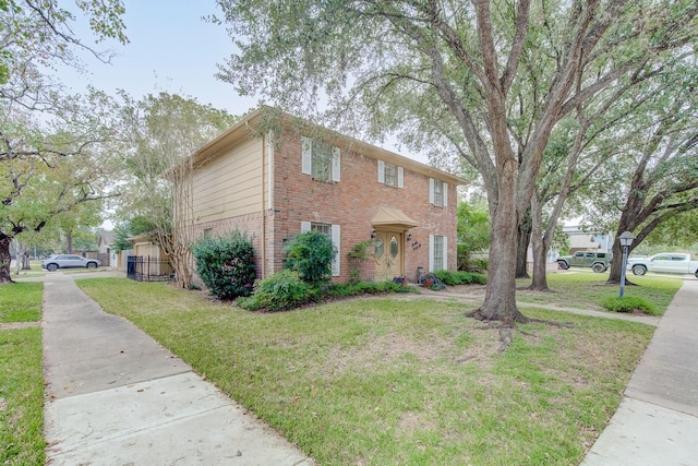 view of front of property with a front lawn