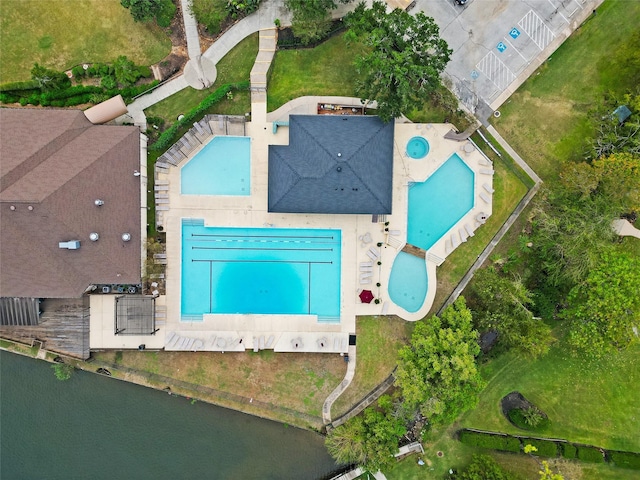 drone / aerial view with a water view