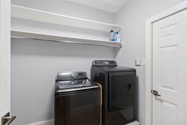 laundry area with washer and dryer