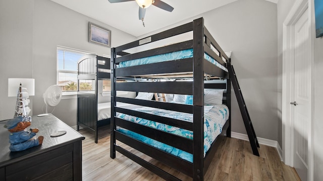 bedroom featuring ceiling fan and light hardwood / wood-style flooring