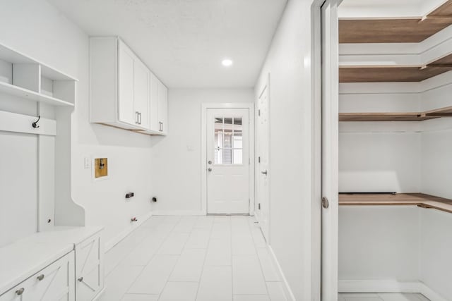 laundry area with electric dryer hookup, gas dryer hookup, and washer hookup