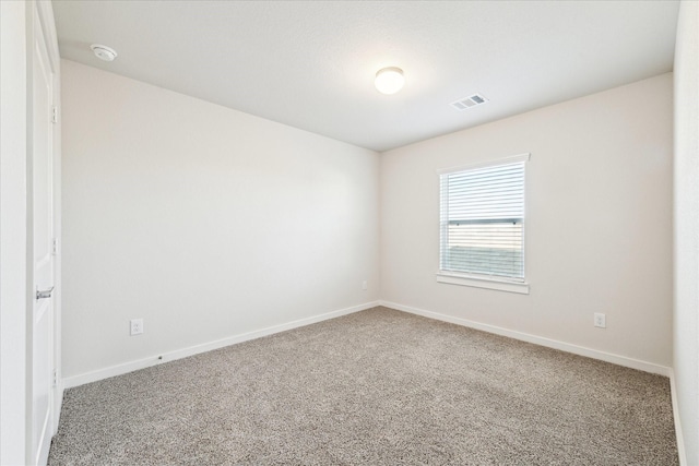 unfurnished room featuring carpet floors