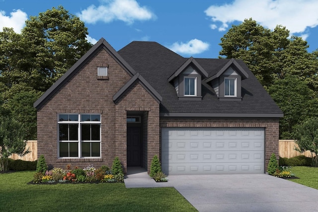 view of front of house with a garage and a front lawn