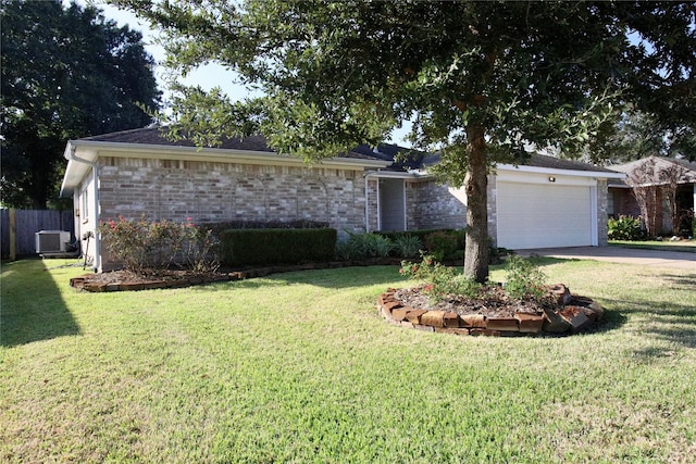 ranch-style home with a garage, central air condition unit, and a front yard