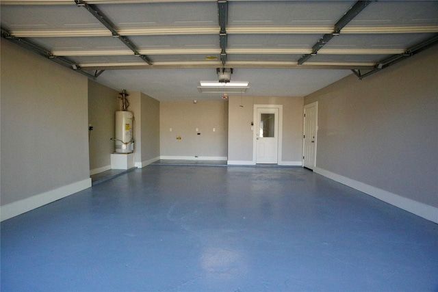 garage featuring a garage door opener and water heater