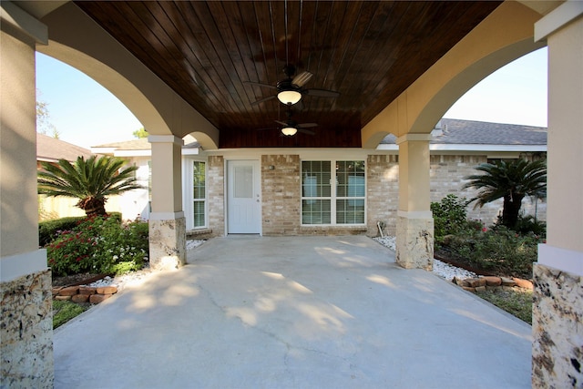 view of patio featuring ceiling fan