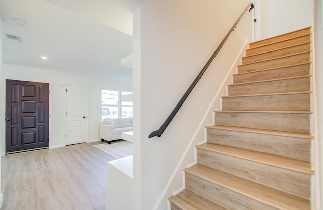 entrance foyer with light wood-type flooring