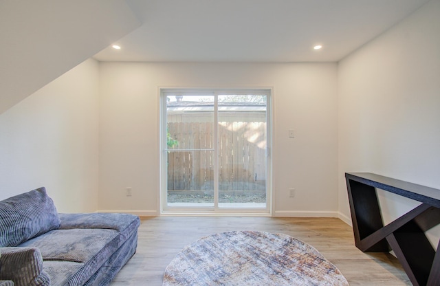 sitting room with light hardwood / wood-style floors