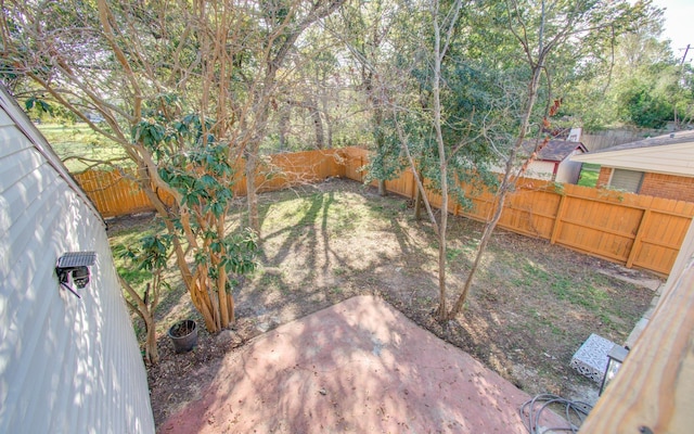 view of yard with a patio area