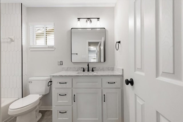 full bathroom featuring vanity, shower / bathtub combination, and toilet