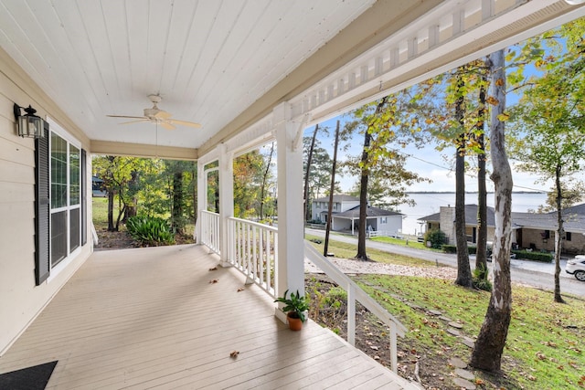 wooden deck with ceiling fan and covered porch