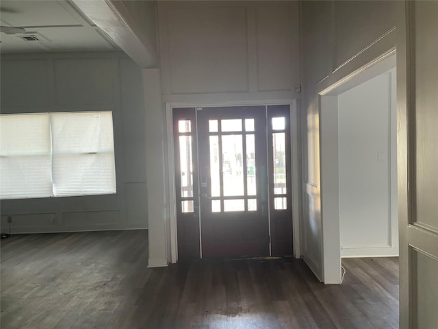 entryway with dark hardwood / wood-style floors