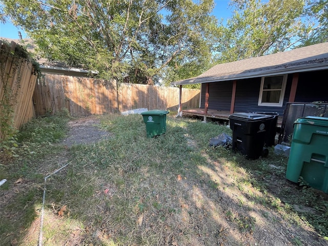 view of yard with a deck