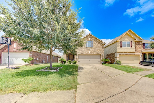 view of front of home featuring a garage and a front yard